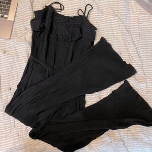 Black crepe ruffle spaghetti strap romper